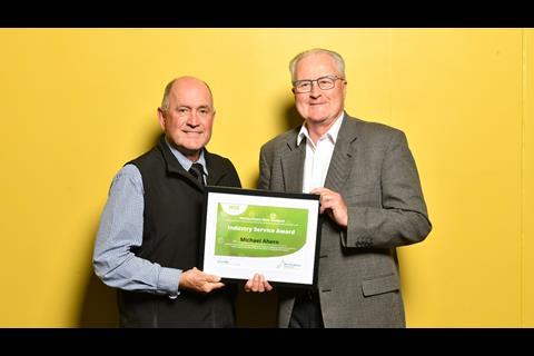 HortNZ president Barry O’Neil presents Michael Ahern with the 2022 Industry Service Award